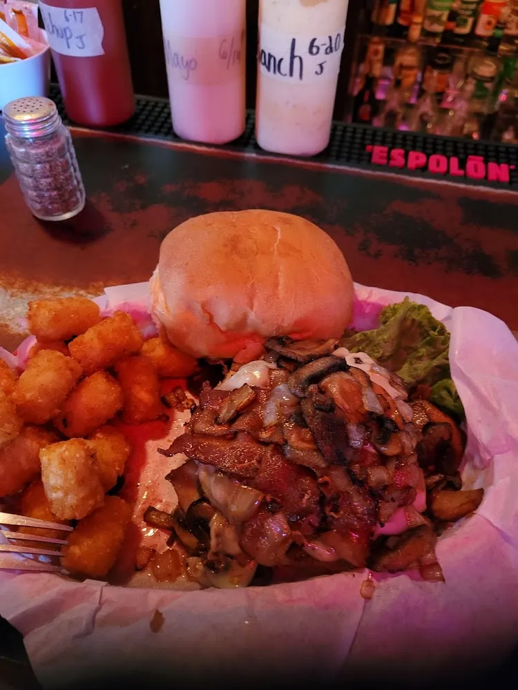 Burger with Bacon Swiss Cheese Sauteed Mushrooms and Onions and Tater Tots